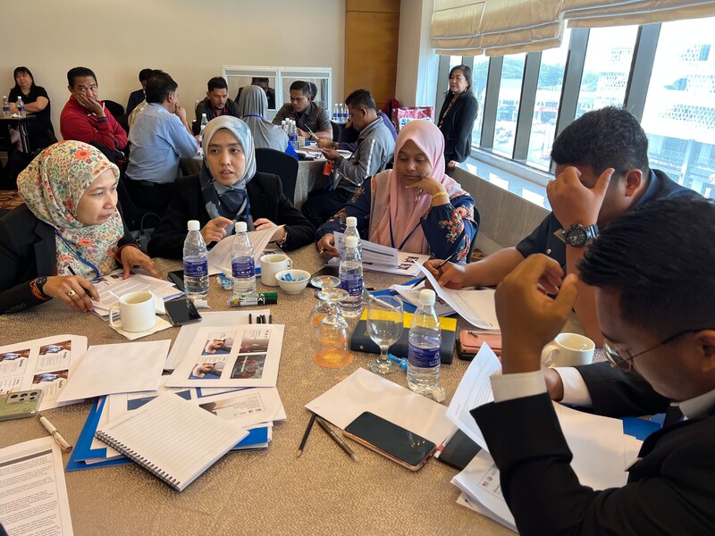 Participants taking part in a group activity at a session in Kelantan.